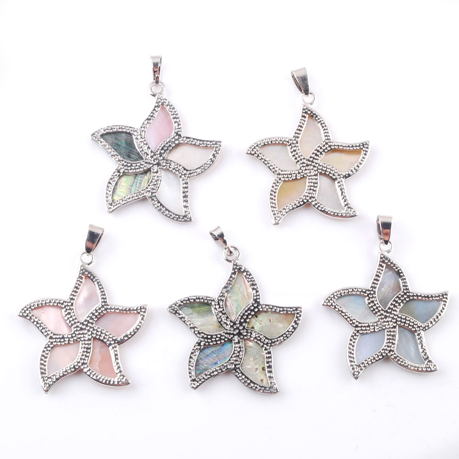 Pendentifs en fleurs de coquil - Jewelry Making New Zealand avis et prix